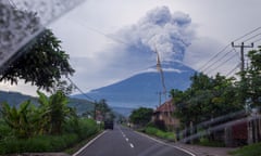Mount Agung is seen spewing heavy volcanic ash from inside the car on November 28, 2017 in Karangasem, Island of Bali, Indonesia