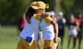 Europe’s Mel Reid and Leona Maguire hug after securing half a point in their fourballs match.