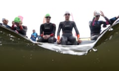 Athletes wait for the race to begin in the women’s triathlon PTVI final.