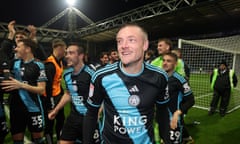 Jamie Vardy and his Leicester teammates celebrate after securing the Championship title.