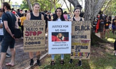 Protesters holding placards at a Black Lives Matter rally