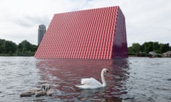 The Mastaba by Christo with swans in London’s Hyde park.