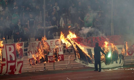 Violence and teargas forces Panathinaikos v Olympiakos derby to be abandoned – video