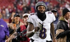 Baltimore  quarterback Lamar Jackson (8) smiles as he runs off the field after the Ravens defeated the San Francisco 49ers on Monday night.