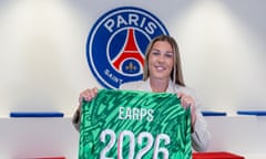 Mary Earps holds a PSG keeper shirt