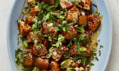 Yotam ottolenghi's harissa roasted pumpkin with tahini sauce.