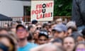 Supporters rally as a placard reads ‘Popular Front’ during a meeting of the electoral coalition of left-wing parties, the ‘Nouveau Front Populaire’, on 22 June.