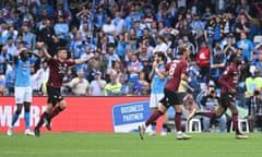 Boulaye Dia (right) celebrates his late equaliser as Napoli players and fans look on in disbelief.