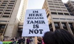 A supporter holds a sign on Tuesday, Nov. 9, 2021, in Cleveland, during a rally for Tamir Rice, who was killed by police seven years ago. Tamir's Campaign for Justice organized the rally as part of the effort to re-open the case. (AP Photo/Ken Blaze)