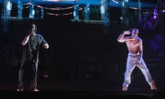 Rapper Snoop Dogg with hologram of Tupac Shakur