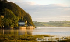 An early morning view of Dylan Thomas' boathouse overlooking Aber Tâf.