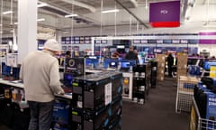 A customer shopping for a computer in PC World, Cambridge