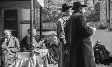 Bidders at Sotheby's auction rooms in London on 25 February 1954