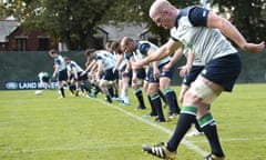 Ireland's lock and captain Paul O'Connell (R) warms up with his team mates during a team training session in Cardiff on September 17, 2015, on the eve of the opening match of the 2015 Rugby World Cup.  AFP PHOTO / DAMIEN MEYER

RESTRICTED TO EDITORIAL USEDAMIEN MEYER/AFP/Getty Images