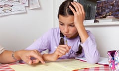 Girl having private tuition at home.