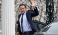 Leo Varadkar waves after stepping out of a car