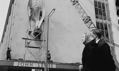 Barbara Hepworth watches her sculpture Winged Figure being installed on the side of the John Lewis store on Oxford Street, London, on 21 April 1963.