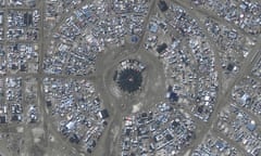 TOPSHOT-US-ENTERTAINMENT-FESTIVAL-BURNINGMAN-CULTURE-WEATHER<br>TOPSHOT - This handout satellite image courtesy of Maxar Technology shows an overview of the center camp of Burning Man festival in Nevada's Black Rock desert on September 4, 2023. Revelers stuck in the mud for days at the Burning Man festival in Nevada finally began heading home on September 4 after Mother Nature rained on their big party.
With the sun now shining on the colorful makeshift community of 70,000 people called Black Rock City, the roads opened Monday afternoon, kicking off the official exit process known as the "Exodus." (Photo by Satellite image ©2023 Maxar Technologies / AFP) / RESTRICTED TO EDITORIAL USE - MANDATORY CREDIT "AFP PHOTO / Satellite image ©2023 Maxar Technologies" - NO MARKETING NO ADVERTISING CAMPAIGNS - DISTRIBUTED AS A SERVICE TO CLIENTS (Photo by -/Satellite image ©2023 Maxar Tech/AFP via Getty Images)