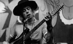 John Mayall with hall playing guitar in black and white pic