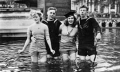 Joyce Digney and Cynthia Covello celebrating VE Day with sailors in a fountain in Trafalgar Square on May 8 1945.