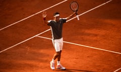 Roger Federer celebrates victory over Stan Wawrinka.