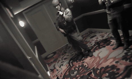 Las Vegas police bodycam shows storming of gunman's hotel room – video  