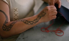 Prisoner in Mexico sewing shoes