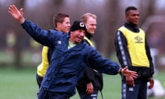 Gianluca Vialli celebrates during a Chelsea training session with Jon Harley (left) in the background.