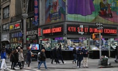 People walk past shops in Manhattan's jewelry district on March 08, 2022 in New York.  