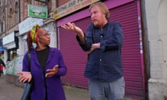 John Harris talking to a woman in Handsworth, Birmingham.