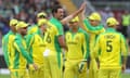 Australia’s Mitchell Starc is congratulated on taking the crucial wicket of Wahab Riaz, to put paid to Pakistan’s fightback