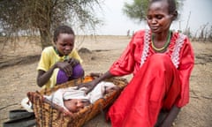 A mother with her daughter and malnourished newborn in South Sudan, one of the 81 countries where low-cost intervention could save many new lives.
