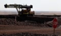 Equipment stands on the Delta 1 mine pit at Hancock Prospecting Pty's Roy Hill Mine operations under construction in the Pilbara region, Western Australia, on Thursday, Nov. 20, 2014. Gina Rinehart, the Asia-Pacific's richest woman, is set to start exports in September from her new A$10 billion ($8.6 billion) iron ore mine undeterred by prices trading near five-year lows and forecast to extend losses. Photographer: Philip Gostelow/Bloomberg via Getty Images  ozstock