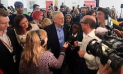 Labour leader Jeremy Corbyn is surrounded by the media during a visit to Leeds.