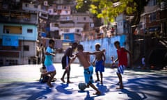 Boys play football in the Borel favela in Rio de Janeiro, Brazil. 