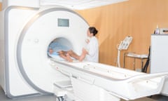 Man entering MRI scanner