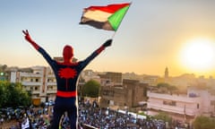 ‘Spidey’ waves to the crowd at an anti-coup rally in central Khartoum.