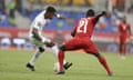 Ivory Coast’s Wilfried Zaha is challenged by Togo’s Djene Dakonan