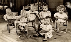 Babies in a nursery in East London in the early 1900s, possibly in a Barnardo’s orphanage or hospital ward.