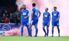 Notts County players look dejected after conceding in the defeat at Swindon