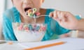 Girl eating bowl of cereal