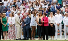 Former Wimbledon champions line up during a celebration of 100 years of Centre Court.