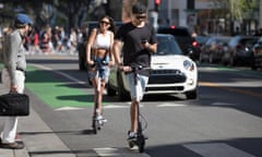 Bird electric scooter riders in Santa Monica, California. 