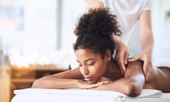 A young woman getting a massage at a spa