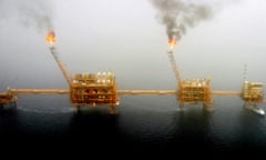 Gas flares from an oil production platform at the Soroush oilfields in the Persian Gulf, south of Tehran.