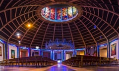 Colourful lights and stunning architectural elements pictured above and around the seating at the Metropolitan Cathedral in Liverpool before Christmas<br>2M4PAG5 Colourful lights and stunning architectural elements pictured above and around the seating at the Metropolitan Cathedral in Liverpool before Christmas