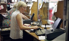 Post office staff at work with the Horizon system, still in use by the organisation.