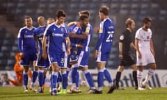 Gillingham celebrate a goal against Milton Keynes Dons last month.