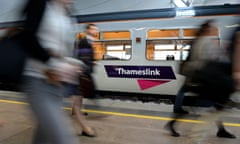 Commuters passing a Thameslink train. Customers across networks have experienced delays and cancellations following new timetables on 20 May.
