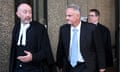 Mark Latham (right) leaves the federal court of Australia in Sydney on Wednesday, with barrister, Kieran Smark SC (left)